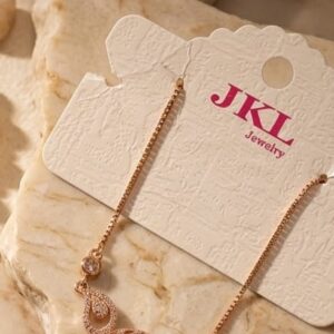 Elegant rose‑gold peacock necklace